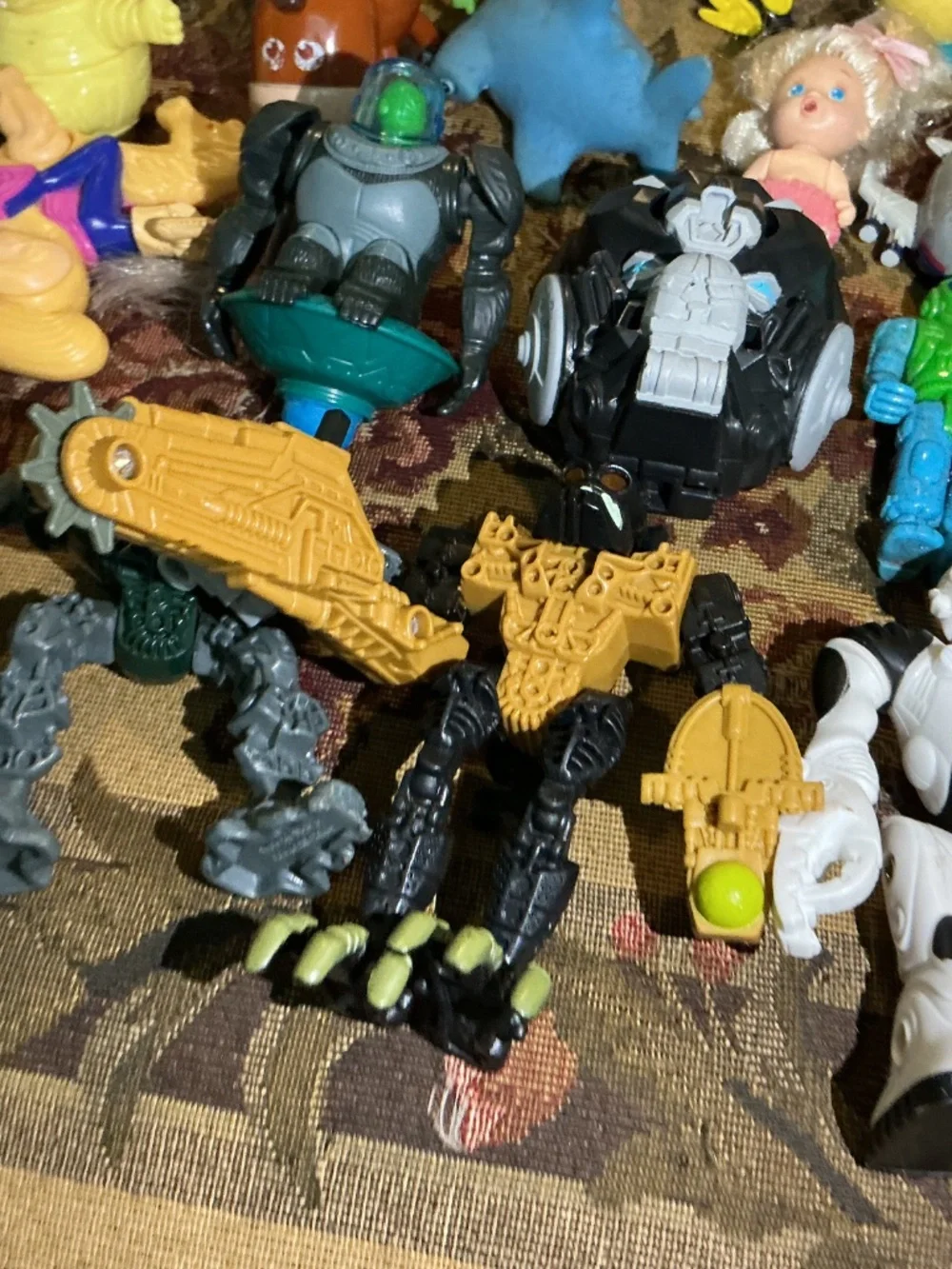 32 Miscellaneous small Toy lot with NBA Bionicle looney tune barbie and more